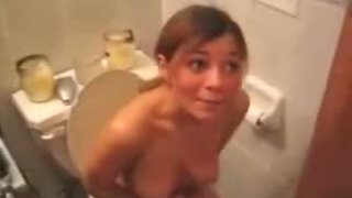 Busty teen in bathroom voyeur