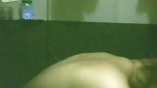 Busty amateur Indian chick takes shower in the bathroom