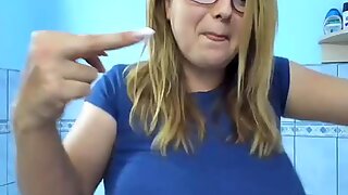 Busty blonde flashes her boobs
